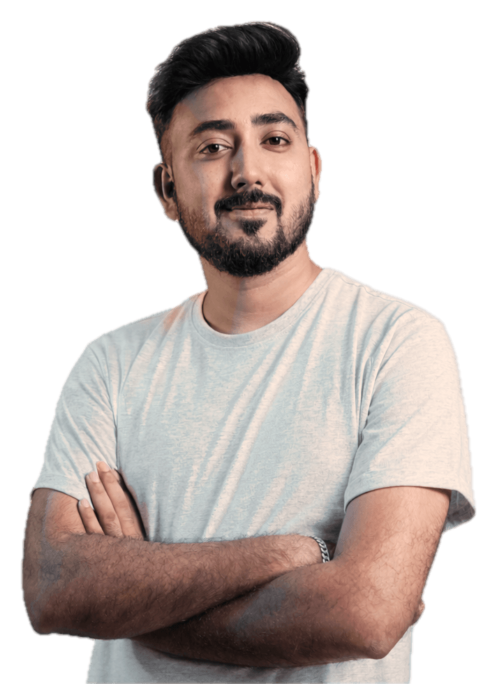 Anurag Gautam, arms crossed, in a light grey T-shirt